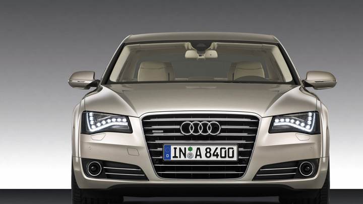 Front Pose Of 2011 Audi A8 In Golden